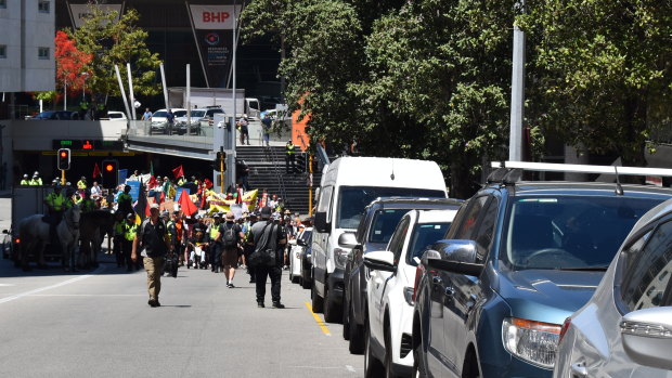 Protesters head from the convention centre to Parliament. 