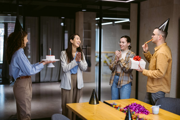 This stock image is a lie. No office birthday celebration has ever looked like this.