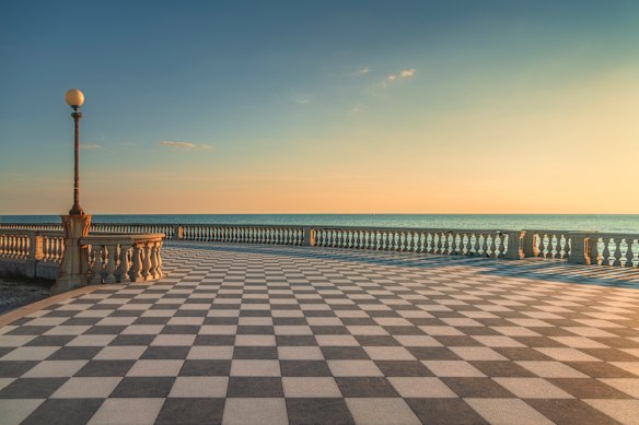 The striking black-and-white chequerboard pavers along the seafront.
