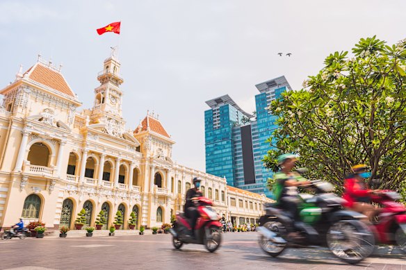 Cross purposes: traffic outside Ho Chi Minh City Hall, Vietnam.