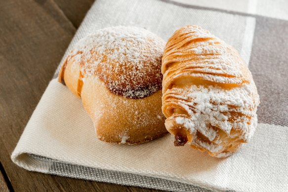Typical Neapolitan pastries sfogliatella riccia and sfogliatella frolla.