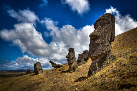 Moais at the Easter Island, a territory of Chile. Moais are human figures carved by the Rapa Nui people in rock.