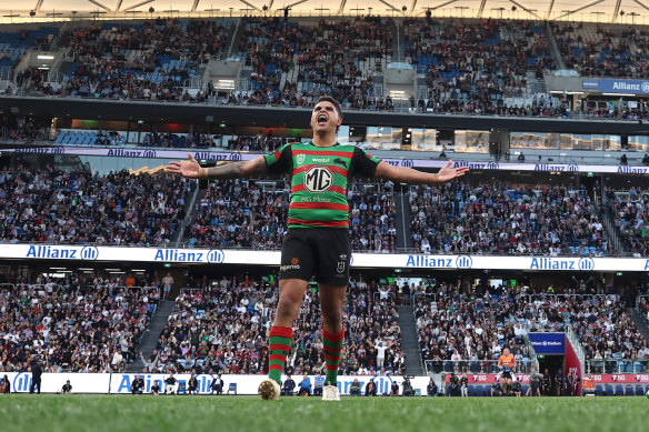 Latrell Mitchell roars to the crowd after nailing a sideline conversion.