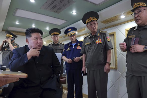 Kim Jong-un supervising the latest test of anti-air missiles at an undisclosed location, in an image provided by the North Korean government.