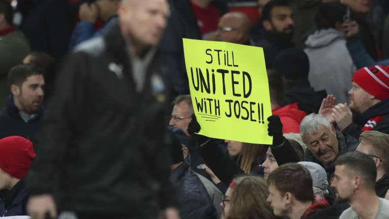 Support: Despite United's poor run of form, some fans are still behind manager Jose Mourinho.