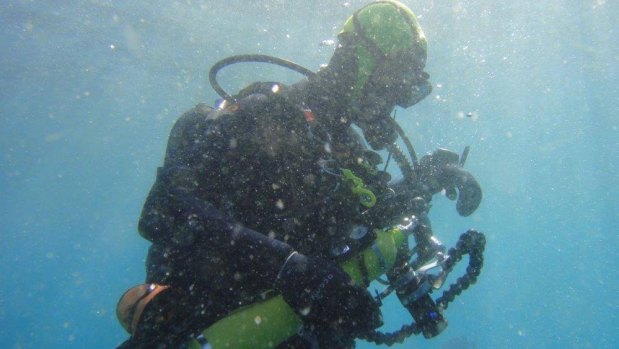 Fisheries Queensland director Andrew Thwaites, 44, was found dead after failing to resurface on a diving trip off Moreton Island.
