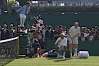 Nick Kyrgios speaks to the chair umpire.
