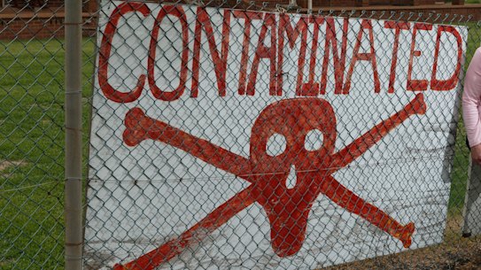 Williamtown resident Kim-Leeanne King celebrates an announcement that the PFAS class action has been settled..