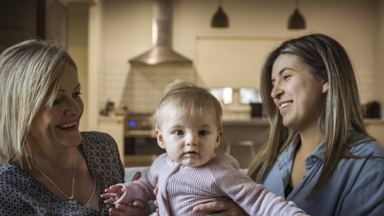 Georgia Ymer and her seven-month old daughter Yindi with lactation consultant Tracey Davey.