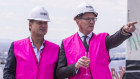 Scape’s Craig Carracher, right, with co-founder Tim Ward at a topping-out ceremony in 2017.