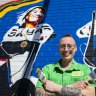 Sarah Rowan with her mural of Saya and Kai Sakakibara on Short Street, Helensburgh.