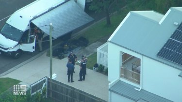 One of the crime scenes in Brisbane on Tuesday afternoon after explosives were found in a suburban home.