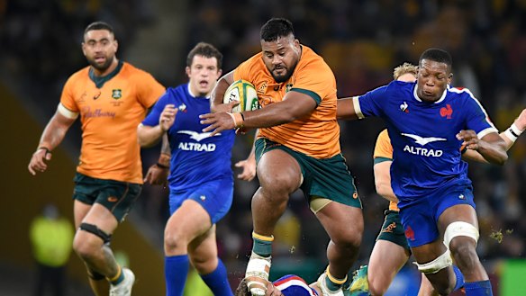 Replacement prop Taniela Tupou makes a ferocious charge late in the match.