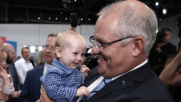 Scott Morrison with baby Ned at a Liberal campaign rally in Launceston during the 2019 election.