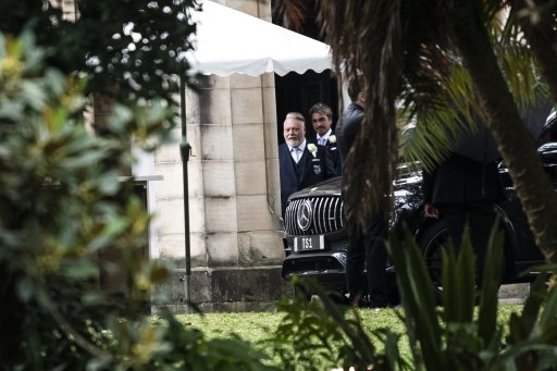 Kyle Sandilands, left, and his groomsman John Ibrahim after the vows.