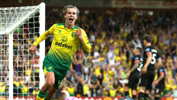 Todd Cantwell of Norwich City celebrates after scoring his team's second goal at Carrow Road.