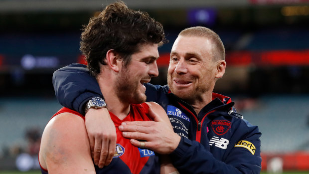 Angus Brayshaw with Melbourne coach Simon Goodwin after their win over the Lions.