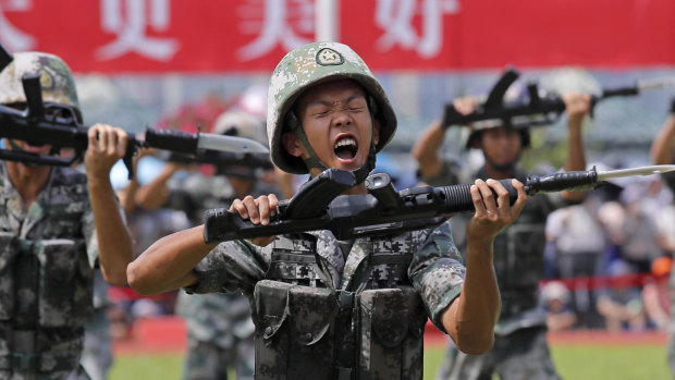 Chinese People's Liberation Army soldiers demonstrate their skill during an open day of Stonecutter Island naval base, in Hong Kong in June. 