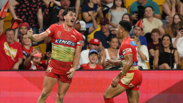 Herbie Farnworth celebrates a try for the Dolphins.