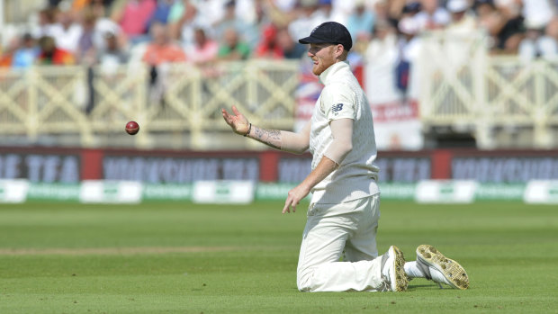 On his knees: England's Ben Stokes fields during the first day of the third Test against India at Trent Bridge.