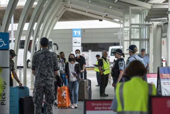 Passengers arriving at Sydney International Airport being transported to hotel quarantine in April.