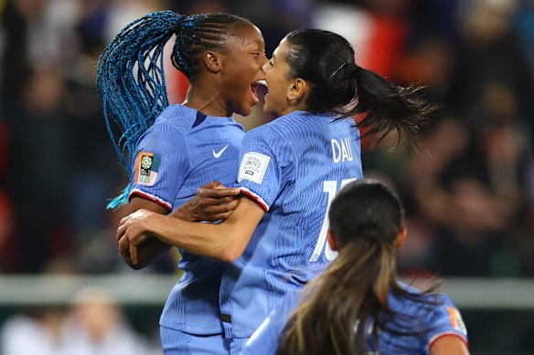 Kenza Dali celebrates scoring their second goal with Kadidiatou Diani.