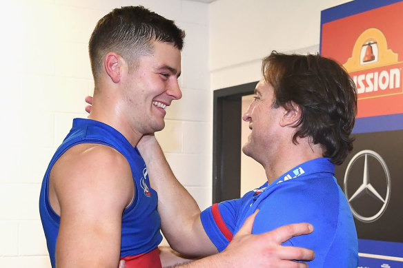 Midfielder Josh Dunkley with Bulldogs coach Luke Beveridge.