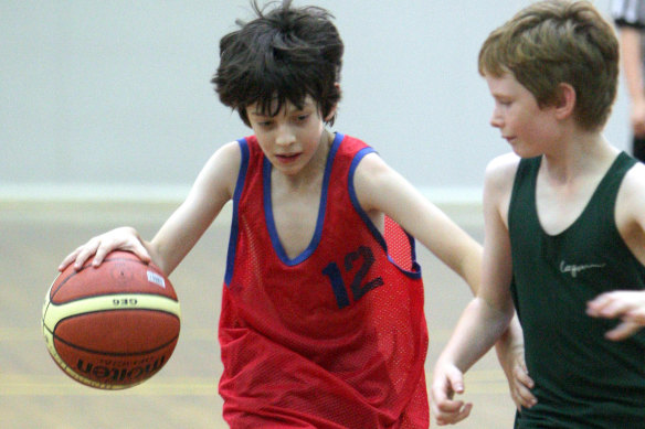 The score is not the most important thing: Boys play basketball in 2009. 