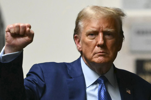 Former president Donald Trump walks to the courtroom following a break in his trial at Manhattan criminal court on May 9.