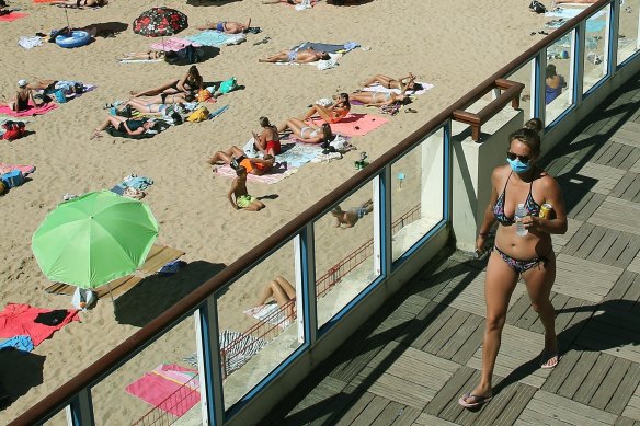 Bikinis and face masks in Saint Jean de Luz, south-western France, during the 2020 European summer. 