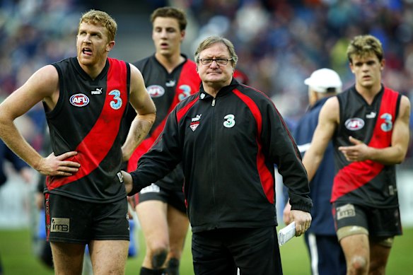 Fletcher and coach Kevin Sheedy after a loss to arch rivals Carlton in 2004.