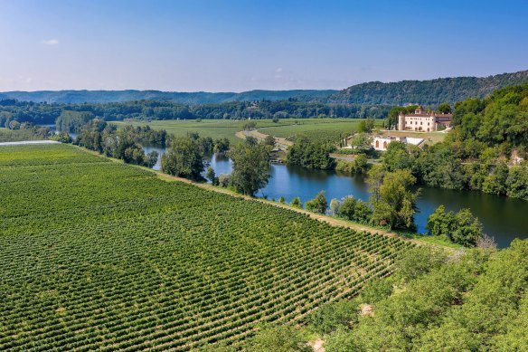 Chateau de Cayx and its vineyards.