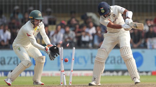 Cheteshwar Pujara is bowled by Nathan Lyon.