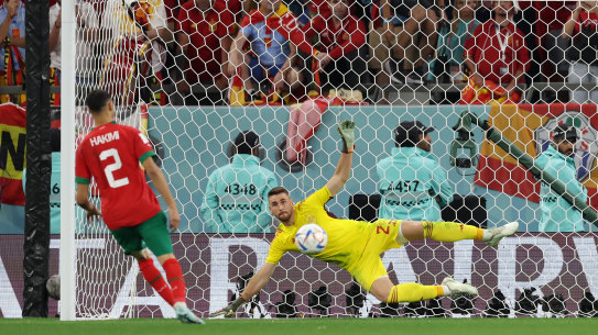 Achraf Hakimi of Morocco scores the team’s fourth and winning penalty.