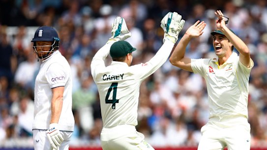 Pat Cummins and Alex Carey celebrate.