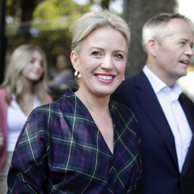 Chloe Shorten and Opposition Leader Bill Shorten depart after a visit to the Salvation Army's Lighthouse Cafe in Melbourne.