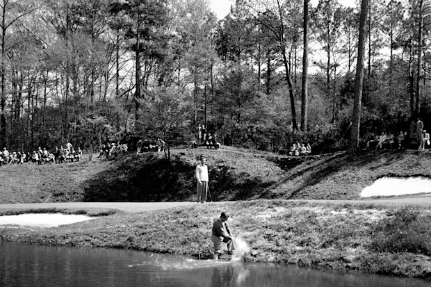 Ky Laffoon plays a shot at the edge of Raes Creek in the 1930s.