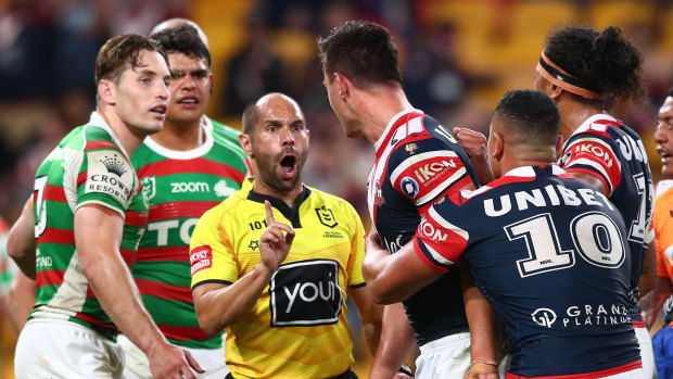 Roosters centre Joseph Manu confronts South Sydney’s Latrell Mitchell.