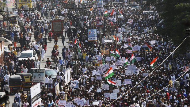 Indians march during a protest against the Citizenship Act in Mumbai on Wednesday.