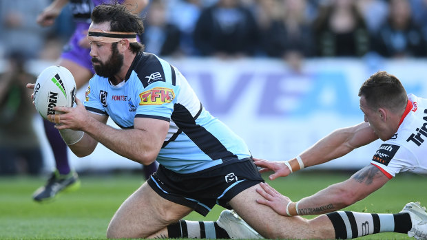 Aaron Woods opens the scoring for the Sharks against the Dragons.