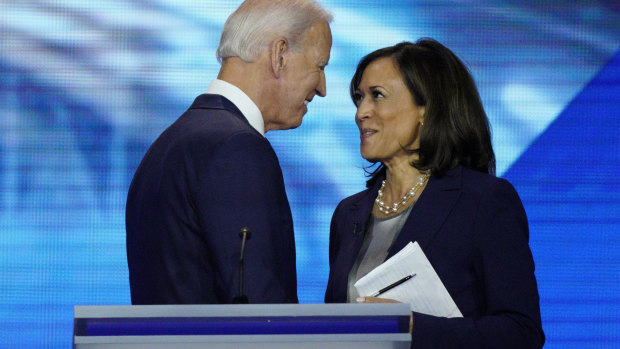 Joe Biden and Kamala Harris shake hands after a Democratic presidential primary debate in September last year.