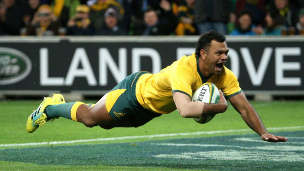 Target man: Kurtley Beale scores a try against Ireland earlier this year.