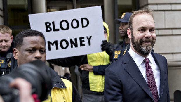 Rick Gates, former deputy campaign manager for Donald Trump, exits a federal courthouse.