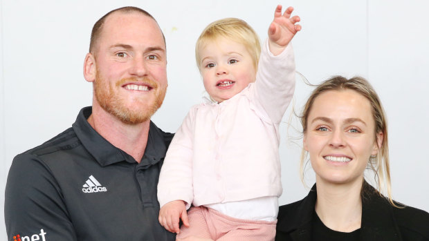 Retiring footballer Jarryd Roughead with his wife Sarah and daughter Pippa.