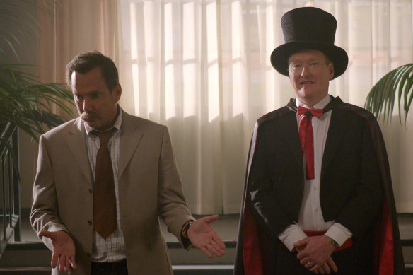 Conan O’Brien (right) is one of the rotating celebrity guests who tries to solve crimes with Will Arnett’s scatterbrained detective in <i>Murderville.