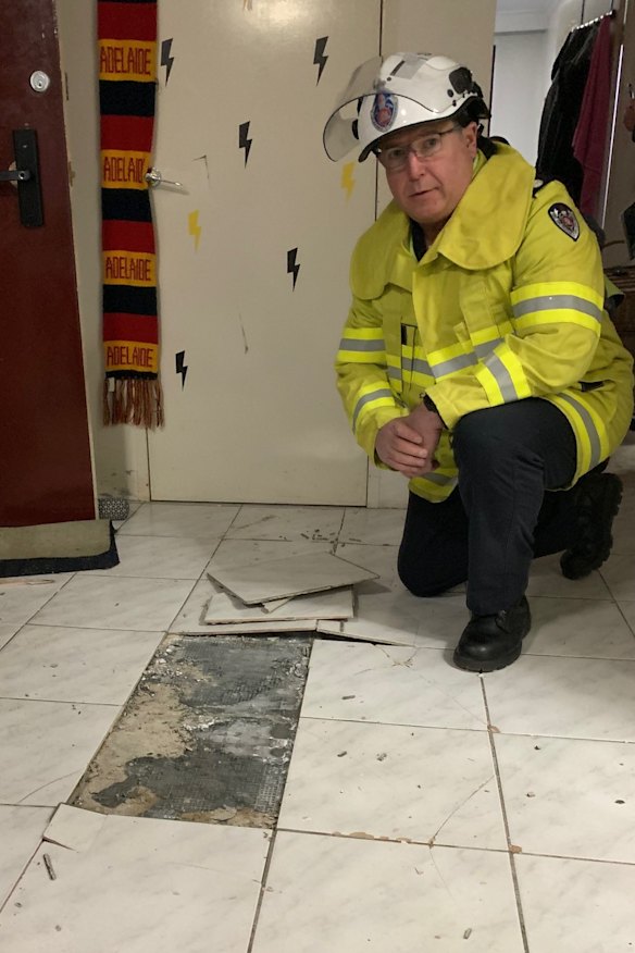 Specialist firefighters from Fire and Rescue NSW investigate the damage.