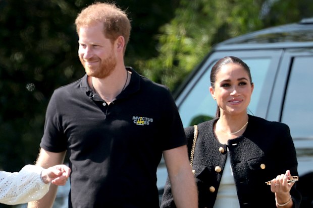 Meghan, Duchess of Sussex and Prince Harry attend the Jaguar Land Rover Driving Challenge on day one of the Invictus Games The Hague 2020 at Zuiderpark on April 16, 2022 in The Hague, Netherlands. (Photo by Chris Jackson/Getty Images for the Invictus Games Foundation )