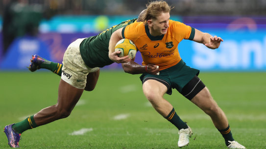 PERTH, AUSTRALIA - AUGUST 17: Max Jorgensen of the Wallabies is tackled during The Rugby Championship match between Australia Wallabies and South Africa Springboks at Optus Stadium on August 17, 2024 in Perth, Australia. (Photo by Janelle St Pierre/Getty Images)