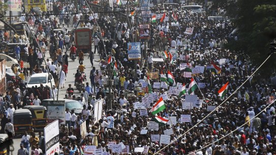 Indians march during a protest against the Citizenship Act in Mumbai on Wednesday.