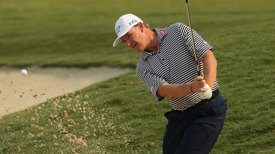 Ernie Els plays out of the bunker on the 14th during the Australian Open second round on Friday.